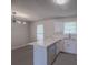 Bright kitchen featuring white cabinets, marble countertops, stainless steel appliances at 5937 Yellowood Ct, Atlanta, GA 30349