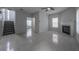 Living Room shows tile flooring, fireplace, stairs, and entry into another room at 5937 Yellowood Ct, Atlanta, GA 30349