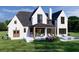 Inviting backyard view with outdoor seating, a covered patio, and pool at 7160 Shady Grove Rd, Cumming, GA 30041