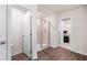 Bathroom featuring a glass-enclosed shower and access to the walk-in closet at 1049 Climbing Rose Way, Mcdonough, GA 30253