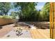 A Zen backyard features a stone walkway, gravel beds, mature trees, and a wood fence at 1130 Mclinden Se Ave, Smyrna, GA 30080