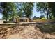 A large backyard with new wood fence and a patio area attached to the house at 1130 Mclinden Se Ave, Smyrna, GA 30080