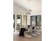 Contemporary dining area features modern lighting, large windows, and comfortable seating at 1130 Mclinden Se Ave, Smyrna, GA 30080