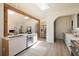Open-concept kitchen showcasing stainless steel appliances and easy access to the living spaces at 1130 Mclinden Se Ave, Smyrna, GA 30080
