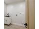 Practical laundry area with a compact sink, modern faucet, and convenient utility connections, maximizing space and efficiency at 1130 Mclinden Se Ave, Smyrna, GA 30080