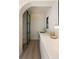 Convenient pantry area with a modern sliding door, sink, and ample counter space at 1130 Mclinden Se Ave, Smyrna, GA 30080