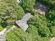 Aerial view of a well maintained home with mature shade trees at 1425 Dalewood Ne Dr, Atlanta, GA 30329