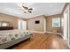 This spacious bedroom has wood floors, a ceiling fan and neutral paint to allow your decor to pop at 1425 Dalewood Ne Dr, Atlanta, GA 30329