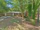 Quaint single-story brick home with green foliage at 1425 Dalewood Ne Dr, Atlanta, GA 30329