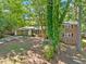 Charming single-story brick home with well-manicured lawn and mature trees at 1425 Dalewood Ne Dr, Atlanta, GA 30329