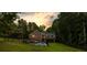 Expansive backyard with pool, fence, and patio area, perfect for outdoor entertaining and relaxation in a private setting at 2230 Ewing Chapel Rd, Dacula, GA 30019