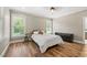 Bedroom with hardwood floors, bright windows, and neutral walls at 2230 Ewing Chapel Rd, Dacula, GA 30019