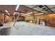 Inside of garage or workshop with finished ceiling and walls, lighting, and a side door at 2230 Ewing Chapel Rd, Dacula, GA 30019