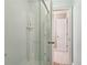 Bathroom shower with glass doors and a tiled shower at 315 Glengarry Chase, Covington, GA 30014