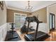 Bright exercise room with modern equipment and hardwood floors at 315 Glengarry Chase, Covington, GA 30014