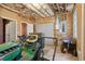 Spacious garage with ample storage space and a John Deere lawn mower at 315 Glengarry Chase, Covington, GA 30014