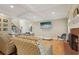 Open living room with hardwood floors, fireplace, and comfortable seating at 315 Glengarry Chase, Covington, GA 30014