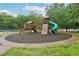 Community playground with climbing structure, slides, swings, and seating at 315 Glengarry Chase, Covington, GA 30014