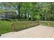 Wide view of the backyard and wooden deck, offering a relaxing outdoor space at 3301 Irish Ln, Decatur, GA 30032