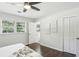 Bedroom featuring hardwood floors, ceiling fan, and ample natural light at 3301 Irish Ln, Decatur, GA 30032