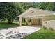 Attached carport featuring a brick exterior, providing convenient covered parking at 3301 Irish Ln, Decatur, GA 30032