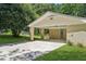 Covered parking with a brick wall design, offering protection and style at 3301 Irish Ln, Decatur, GA 30032