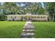 Charming brick home with a manicured lawn and inviting front entrance, great curb appeal at 3301 Irish Ln, Decatur, GA 30032