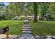 Traditional brick home featuring an inviting entrance with a well-kept lawn at 3301 Irish Ln, Decatur, GA 30032