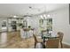 Spacious kitchen featuring breakfast bar, stainless appliances, and an adjacent eat-in area at 3301 Irish Ln, Decatur, GA 30032