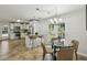 Open kitchen featuring a dining area, breakfast bar, and stainless steel appliances at 3301 Irish Ln, Decatur, GA 30032