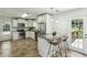 Updated kitchen with stainless steel appliances, granite countertops, and breakfast bar with seating at 3301 Irish Ln, Decatur, GA 30032