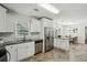 Updated kitchen featuring granite countertops, stainless steel appliances and a breakfast bar at 3301 Irish Ln, Decatur, GA 30032