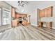 Bright kitchen features wood cabinets, stainless steel appliances, and a view of the breakfast nook at 4601 Ethel Springs Sw Trl, Mableton, GA 30126