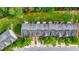 An aerial view of townhomes with well-maintained green spaces and community areas at 2348 Bigwood Trl, Atlanta, GA 30349