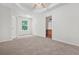 Bright bedroom featuring lots of natural light and neutral carpeting at 2348 Bigwood Trl, Atlanta, GA 30349