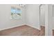 Dining room with wood-look floors with a window providing great natural light at 2348 Bigwood Trl, Atlanta, GA 30349