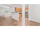 A view of the open concept connecting the living and kitchen areas at 2348 Bigwood Trl, Atlanta, GA 30349