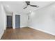 Spacious bedroom with hardwood floors, a ceiling fan, and a neutral color palette at 2411 Second Ave, Decatur, GA 30032