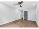 Bedroom with neutral walls, hardwood floors, and a ceiling fan at 2411 Second Ave, Decatur, GA 30032