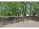 Wooden deck with metal framing and surrounding trees at 2411 Second Ave, Decatur, GA 30032