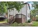 Back exterior view of a home with a wooden deck and stairs at 2411 Second Ave, Decatur, GA 30032