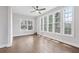 Bright living room with hardwood floors and large windows providing ample natural light at 2411 Second Ave, Decatur, GA 30032