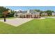 Expansive backyard with basketball court, ideal for recreation and enjoying the outdoors at 2825 Ellenwood Village Way, Ellenwood, GA 30294