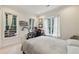 Bedroom with two bright windows and a gaming desk at 3280 Stillhouse Se Ln # 212, Atlanta, GA 30339