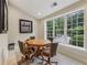 Cozy game room with a window view featuring a table and chairs for board games at 3280 Stillhouse Se Ln # 212, Atlanta, GA 30339