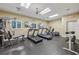 Fully equipped fitness center with cardio machines, weights, and ample workout space at 3280 Stillhouse Se Ln # 212, Atlanta, GA 30339