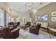 Cozy living room with comfortable leather chairs, perfect for relaxing or entertaining guests at 3280 Stillhouse Se Ln # 212, Atlanta, GA 30339