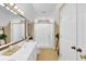 Bright bathroom featuring double sinks, shower and natural light at 3909 Laurens Ln, Snellville, GA 30039