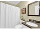 Clean bathroom featuring a shower, vanity, and neutral color scheme at 3909 Laurens Ln, Snellville, GA 30039