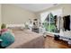 Bright bedroom with large window, desk, and ample storage at 3909 Laurens Ln, Snellville, GA 30039